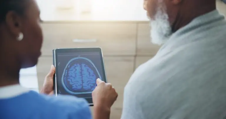 healthcare-tablet-screen-brain-scan-by-doctor-with-old-man-medical-analysis-diagnosis-neuro-digital-radiography-neurologist-patient-alzheimer-dementia-memory-loss-surgery