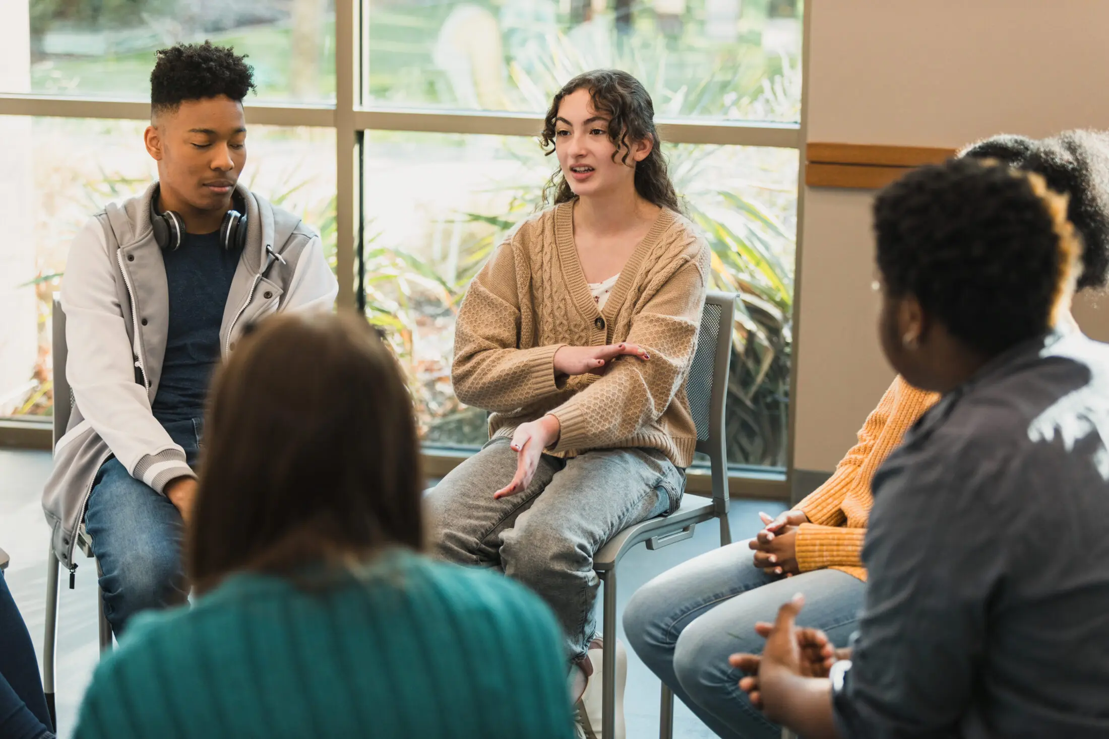Young people in a group therapy session 